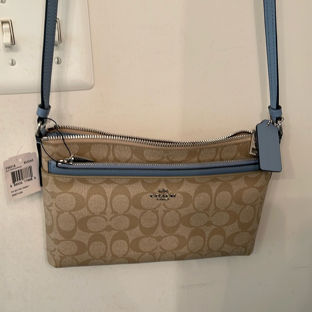 Cross body/shoulder bag with separate pouch